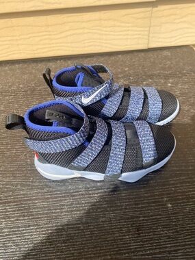 LeBron James Nike Kids Black and Blue Hook-and-Loop Athletic Sneakers.